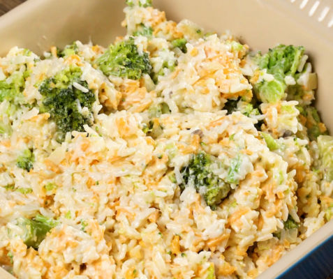 Baking dish filled with broccoli and cheese casserole