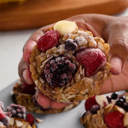 close up of an oatmeal bite being held by a hand