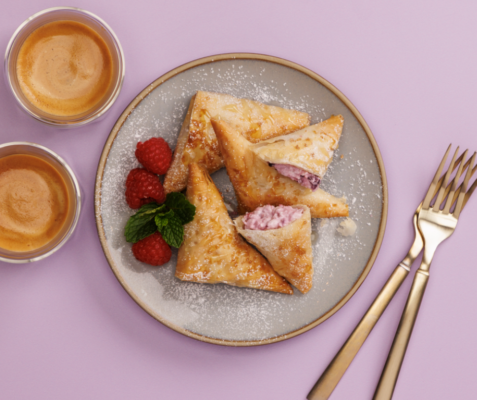 Triple Berry Ricotta Cheese Phyllo Turnovers on a plate