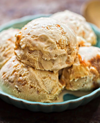 Salted caramel ice creams on blue plate