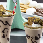 Two s'mores milkshakes sitting in display