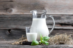 Pitcher and glass of milk