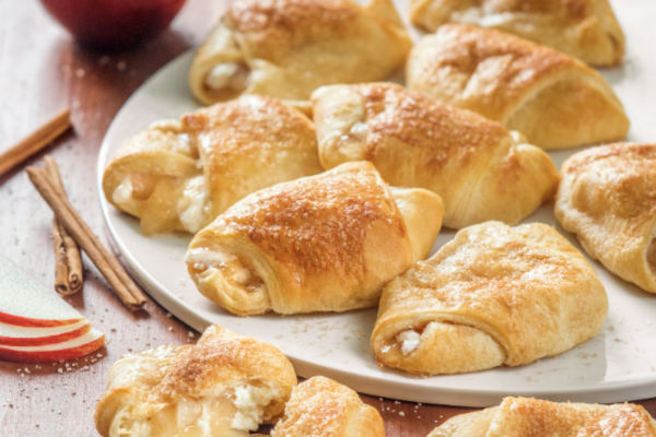 a plate filled with filled croissants