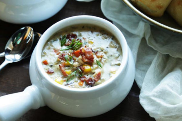 Soup in a white bowl with a handle