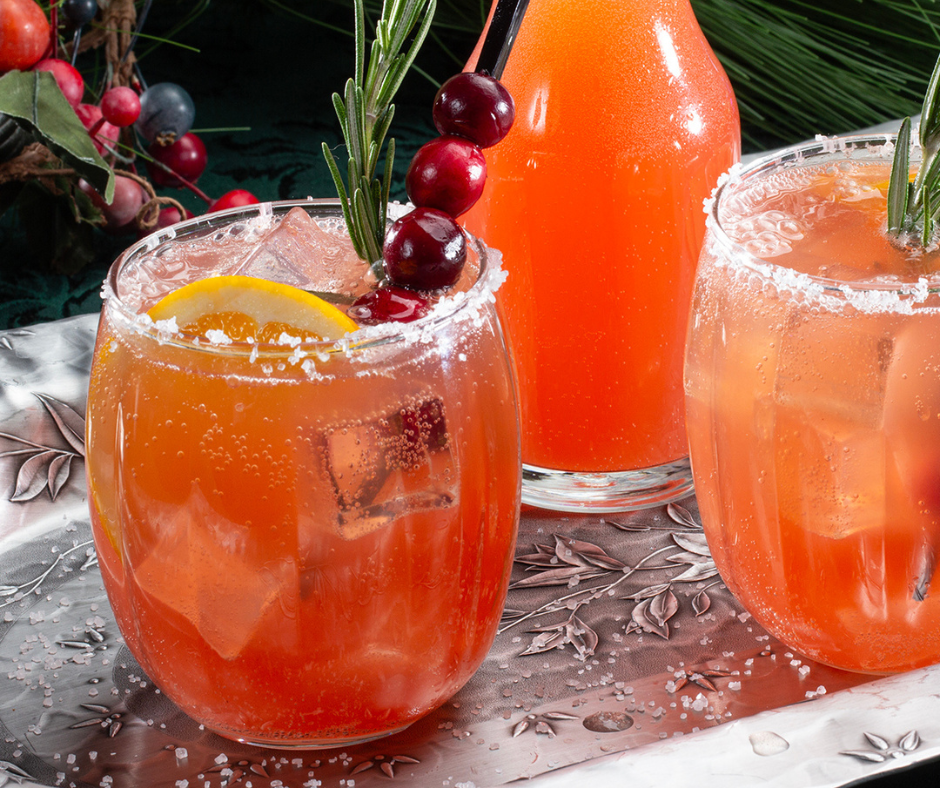 A glass filled with Cranberry Prosecco Cocktail