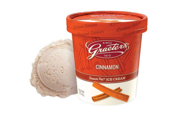 A pint of Graeter's Cinnamon French Pot Ice Cream next to a scoop of ice cream