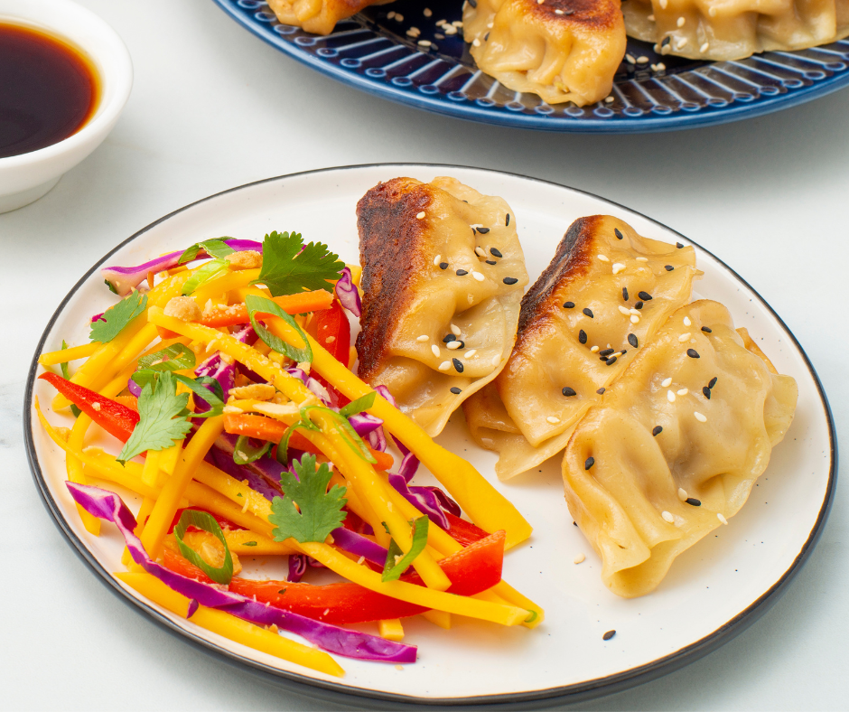 Pork Potstickers with Mango Cabbage Slaw