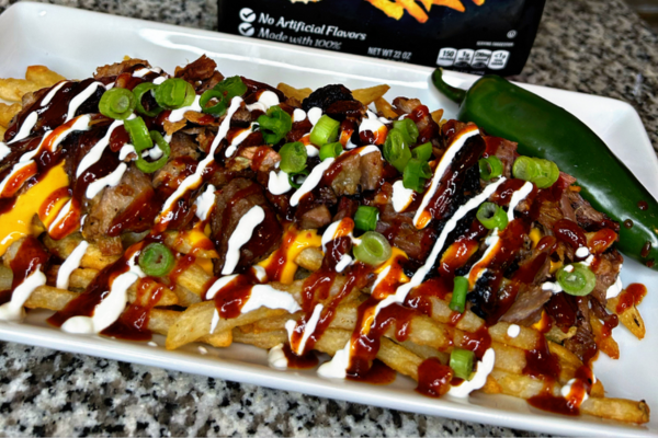 a plate of loaded bbq fries