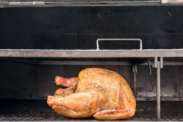 a thanksgiving turkey on a grill