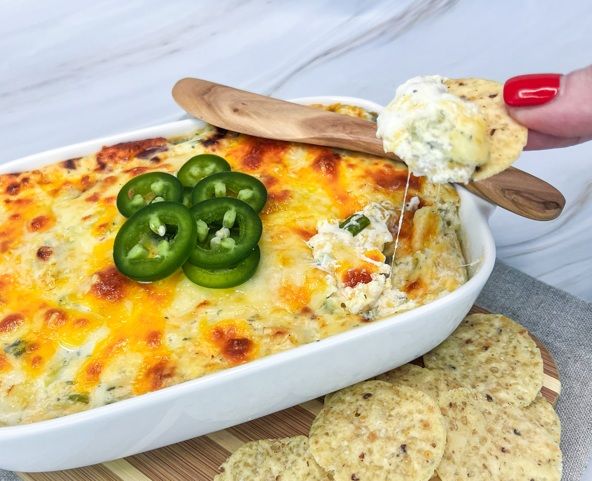 Baked jalapeño popper cream cheese dip topped with crumbs
