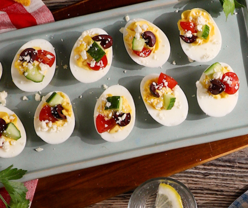 2 lines of deviled eggs on a plate