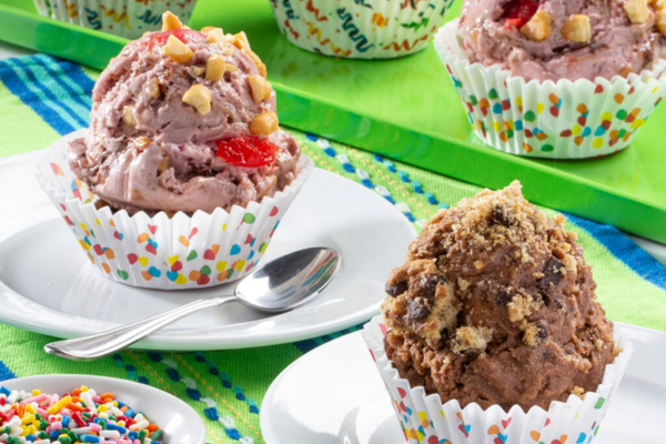 direct shot of two ice cream cookie cups on a white plate