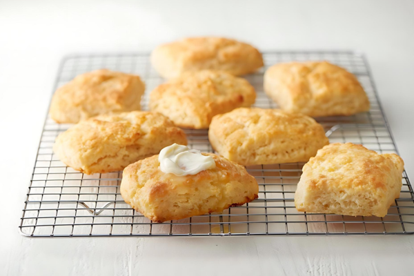 butter biscuits sitting on a cooling rack