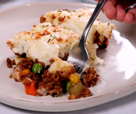 A piece of shepherd's pie on a plate