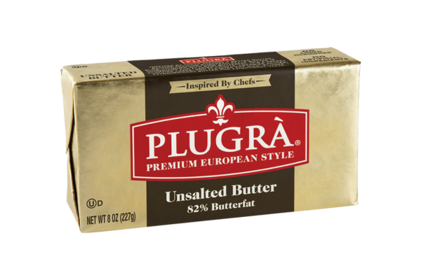 Gold pack of butter with large red box with "plugra" written in it