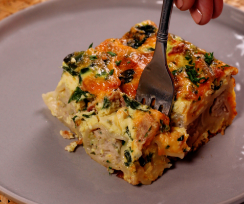 a slice of Potsticker and Spinach Breakfast Strata