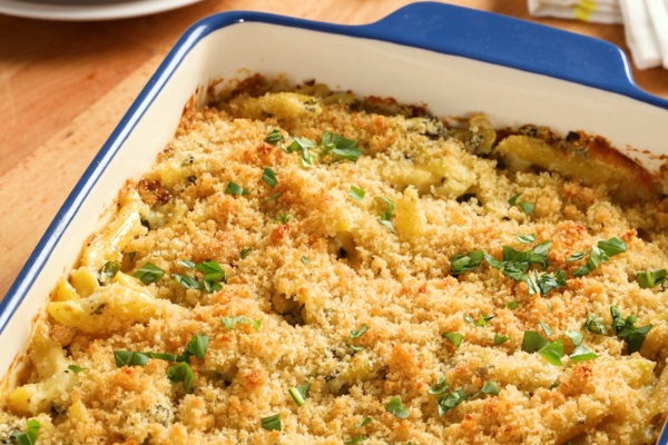 Cooking pan filled with pasta with bread crumbs on top