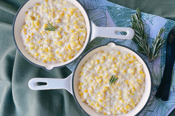 Two bowls of creamed corn