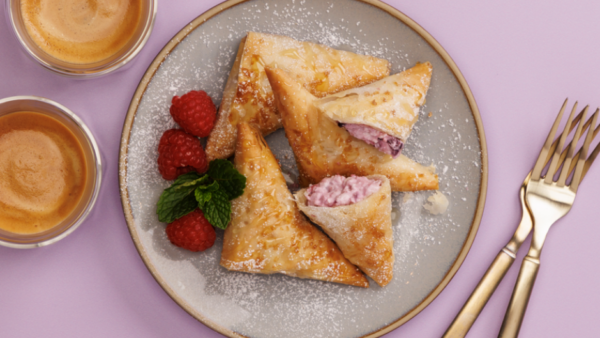 Triple Berry Ricotta Cheese Phyllo Turnovers on a plate