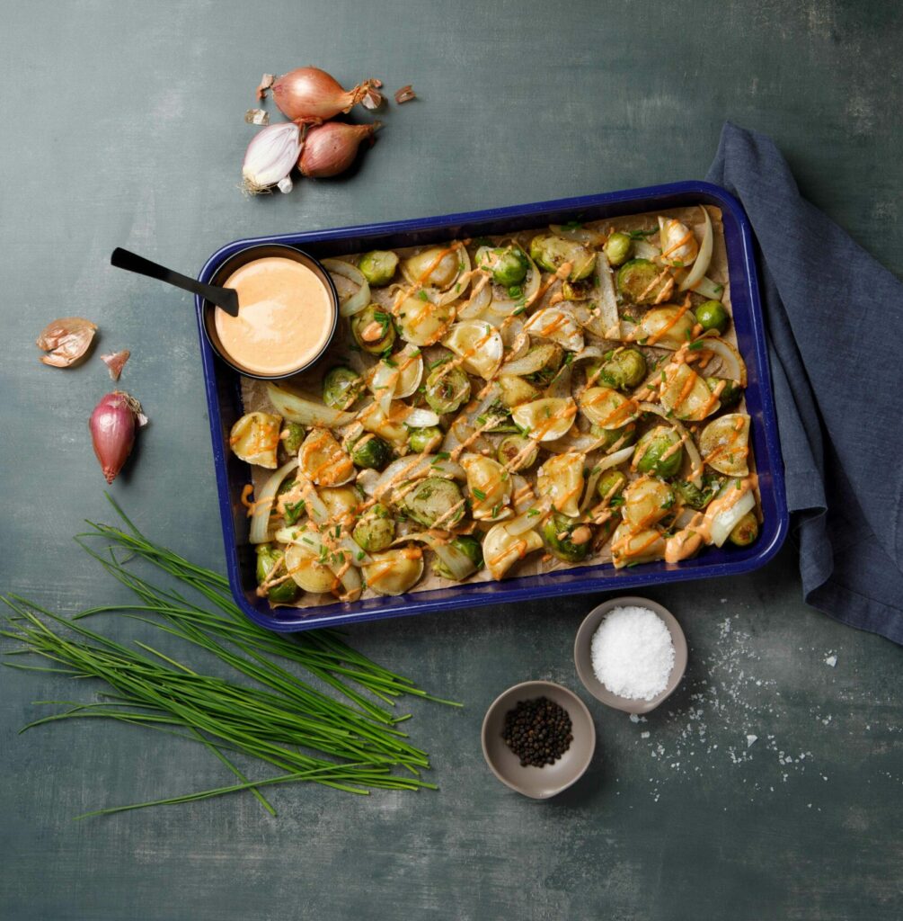 Sheet Pan Roasted Pierogies with caramelized onions and brussels sprouts